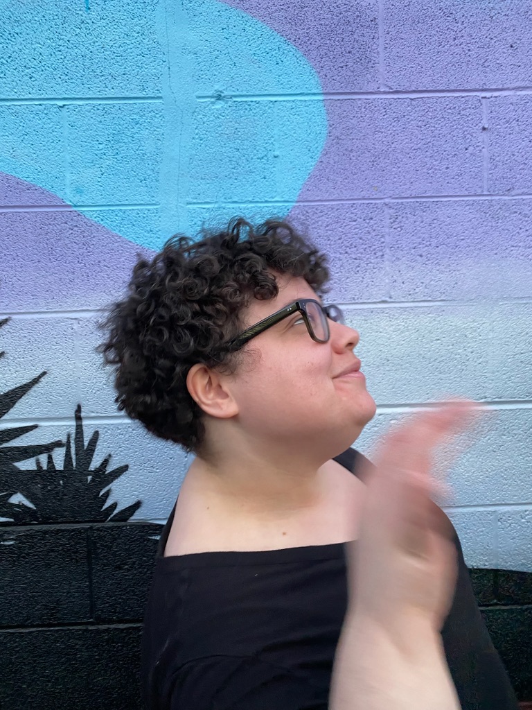 Treasure in front of a colorful mural